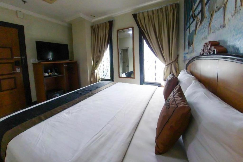 Amos Cozy Hotel Melawai Cakarta Dış mekan fotoğraf